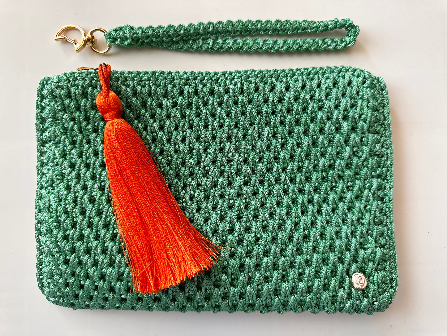 Green Hand-Crocheted Luxury Clutch Bag With Orange Tassel Detail